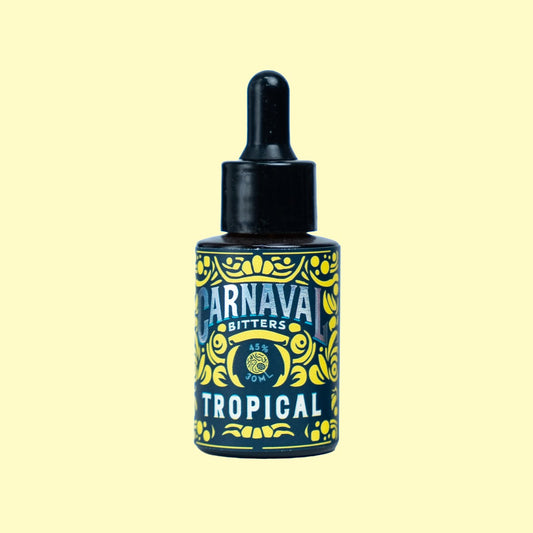 Carnaval Bitters Tropical 30 ml sobre fondo amarillo: bíter aromático cítrico y frutal